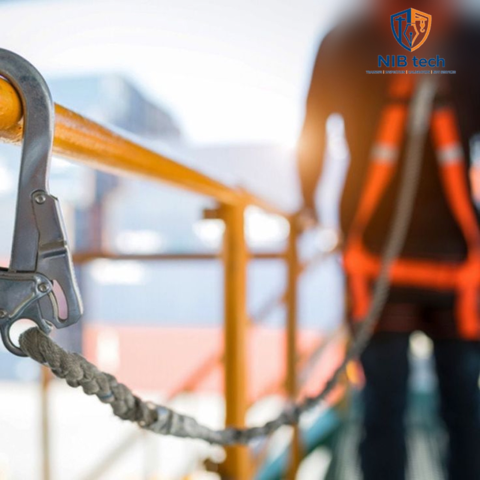 Safety harness lanyard secured to a guardrail anchor point